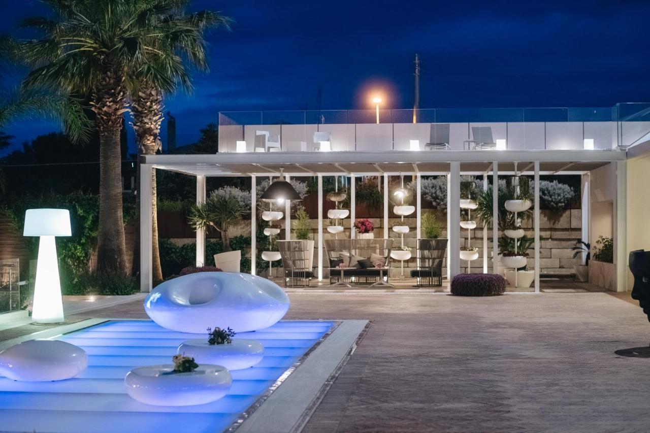 Mec Paestum Hotel Esterno foto The hotel's pool