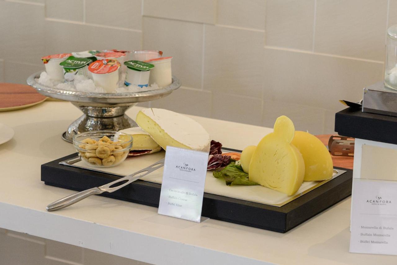 Mec Paestum Hotel Esterno foto A selection of cheese and fruit at a buffet
